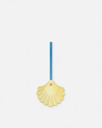 Breloque en cuir en forme de coquillage