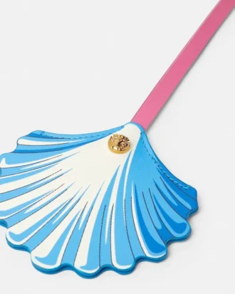 Breloque en cuir en forme de coquillage