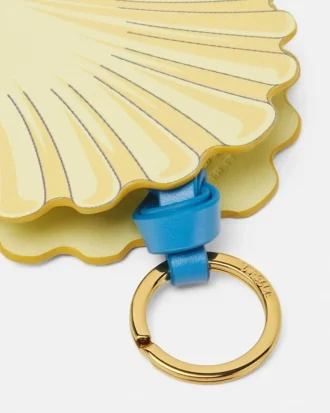 Breloque en cuir en forme de coquillage