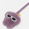 Breloque Medusa en peau lainée duveteuse Breloque Medusa en peau lainée duveteuse