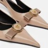 Escarpins à bride arrière en cuir verni Gianni Ribbon 45 mm Escarpins à bride arrière en cuir verni Gianni Ribbon 45 mm