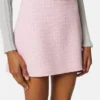 Mini-jupe trapèze en crêpe de laine tweed Mini-jupe trapèze en crêpe de laine tweed