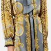 Mini-robe lavallière en soie foulard imprimé léopard Mini-robe lavallière en soie foulard imprimé léopard