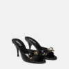 Mules à nœud Opera en cuir verni 85 mm Mules à nœud Opera en cuir verni 85 mm