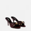Mules à nœud Opera en cuir verni 85 mm Mules à nœud Opera en cuir verni 85 mm