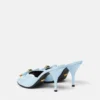 Mules à nœud Opera en cuir verni 85 mm Mules à nœud Opera en cuir verni 85 mm