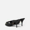 Mules à nœud Opera en cuir verni 85 mm Mules à nœud Opera en cuir verni 85 mm