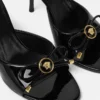 Mules à nœud Opera en cuir verni 85 mm Mules à nœud Opera en cuir verni 85 mm