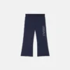 Pantalon de survêtement évasé pour enfant avec logo Versace pailleté Pantalon de survêtement évasé pour enfant avec logo Versace pailleté