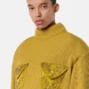 Pull carré en maille de laine clouté