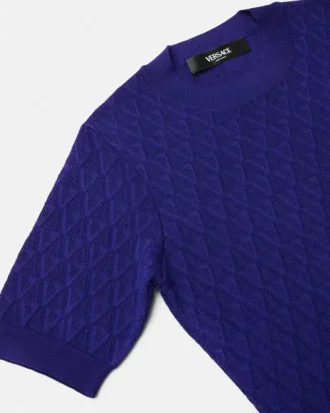Robe midi en maille jacquard à motif V intégral