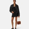 Sac à bandoulière Kleio en daim matelassé Sac à bandoulière Kleio en daim matelassé
