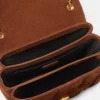 Sac à bandoulière Kleio en daim matelassé Sac à bandoulière Kleio en daim matelassé