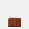 Sac à bandoulière Kleio en daim matelassé Sac à bandoulière Kleio en daim matelassé
