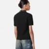 Top en satin envers clouté Top en satin envers clouté