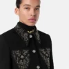 Veste courte en laine cloutée